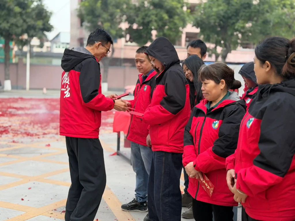 Padmat Rubber holds post-relocation ceremony at its new factory in China, with employees attending the traditional blessing event after factory relocation