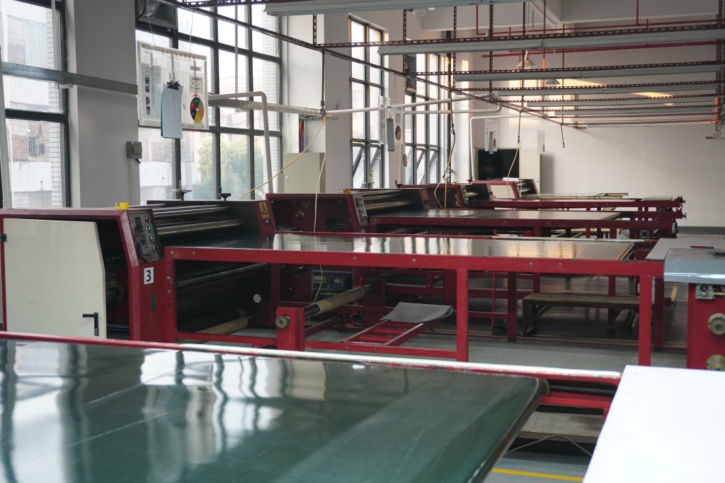 Transfer printing machines inside Padmat Rubber’s new facility, used for producing customized rubber mats as a rubber mat OEM supplier.