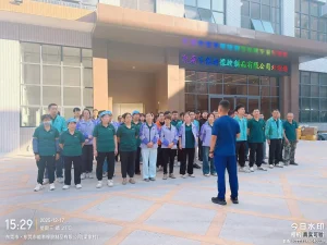 Firefighters providing factory fire safety training to employees during an on-site fire drill at Padmat Rubber.